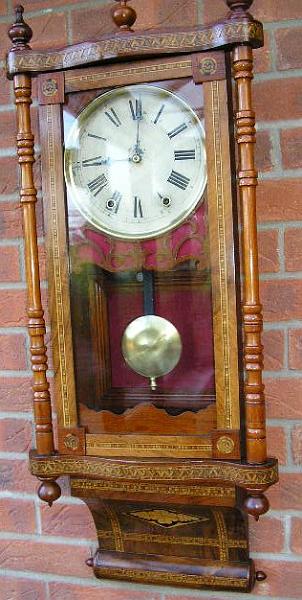 Pb110001.jpg - An American 'Tall Case Clock' by the New Haven Clock Co of Connecticut (circa 1880).  Found derelict in the loft of the owner who said  "It Belonged to my Great Grandmother".  New Verge fitted plus other parts.  Now in daily use.